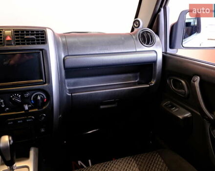 Білий Сузукі Джімні, об'ємом двигуна 1.3 л та пробігом 122 тис. км за 14900 $, фото 35 на Automoto.ua