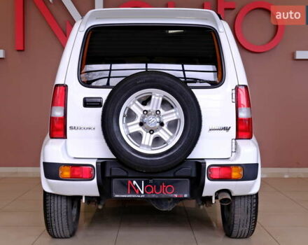 Білий Сузукі Джімні, об'ємом двигуна 1.3 л та пробігом 122 тис. км за 14900 $, фото 12 на Automoto.ua