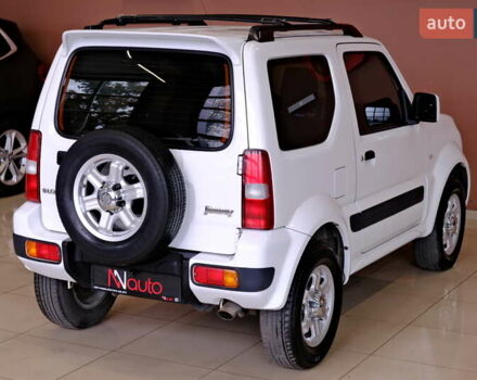 Білий Сузукі Джімні, об'ємом двигуна 1.3 л та пробігом 122 тис. км за 14900 $, фото 13 на Automoto.ua