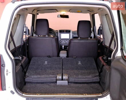 Білий Сузукі Джімні, об'ємом двигуна 1.3 л та пробігом 122 тис. км за 14900 $, фото 39 на Automoto.ua