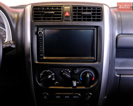 Білий Сузукі Джімні, об'ємом двигуна 1.3 л та пробігом 122 тис. км за 14900 $, фото 36 на Automoto.ua