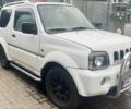 Белый Сузуки Джимни, объемом двигателя 1.3 л и пробегом 240 тыс. км за 4300 $, фото 2 на Automoto.ua