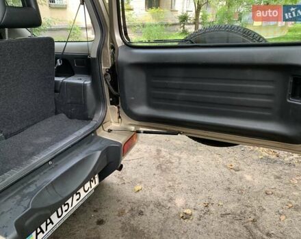 Бежевий Сузукі Джімні, об'ємом двигуна 1.3 л та пробігом 157 тис. км за 7500 $, фото 11 на Automoto.ua