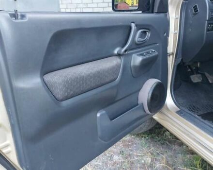 Бежевий Сузукі Джімні, об'ємом двигуна 1.6 л та пробігом 186 тис. км за 9200 $, фото 5 на Automoto.ua