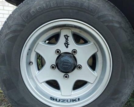 Бежевий Сузукі Джімні, об'ємом двигуна 1.6 л та пробігом 186 тис. км за 9200 $, фото 14 на Automoto.ua