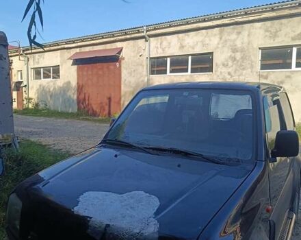 Черный Сузуки Джимни, объемом двигателя 1.3 л и пробегом 234 тыс. км за 4000 $, фото 2 на Automoto.ua