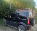 Черный Сузуки Джимни, объемом двигателя 1.3 л и пробегом 234 тыс. км за 4000 $, фото 3 на Automoto.ua