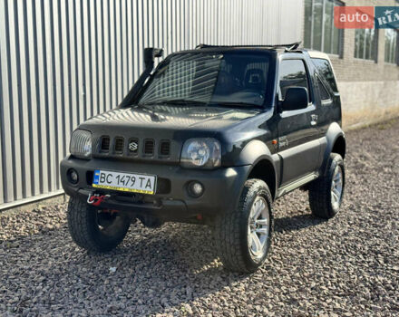 Черный Сузуки Джимни, объемом двигателя 1.3 л и пробегом 100 тыс. км за 7200 $, фото 6 на Automoto.ua
