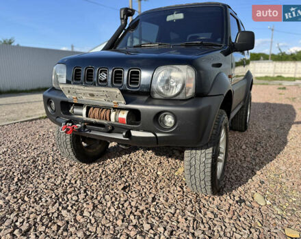 Черный Сузуки Джимни, объемом двигателя 1.3 л и пробегом 100 тыс. км за 7200 $, фото 3 на Automoto.ua