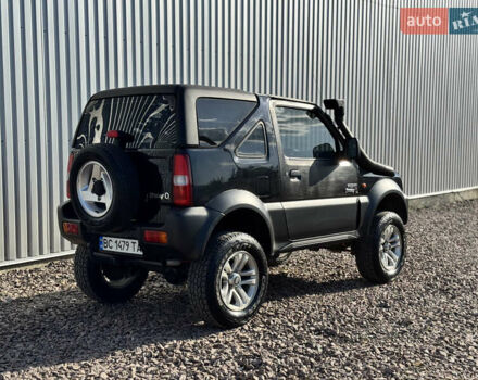 Черный Сузуки Джимни, объемом двигателя 1.3 л и пробегом 100 тыс. км за 7200 $, фото 2 на Automoto.ua