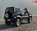 Черный Сузуки Джимни, объемом двигателя 1.3 л и пробегом 100 тыс. км за 7200 $, фото 2 на Automoto.ua