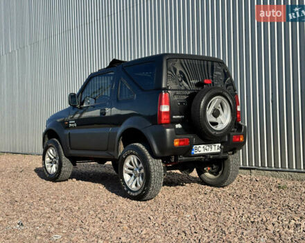 Черный Сузуки Джимни, объемом двигателя 1.3 л и пробегом 100 тыс. км за 7200 $, фото 7 на Automoto.ua