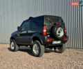 Черный Сузуки Джимни, объемом двигателя 1.3 л и пробегом 100 тыс. км за 7200 $, фото 7 на Automoto.ua
