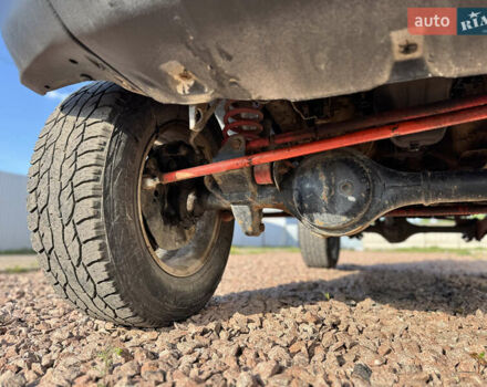 Черный Сузуки Джимни, объемом двигателя 1.3 л и пробегом 100 тыс. км за 7200 $, фото 10 на Automoto.ua