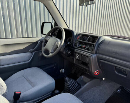 Черный Сузуки Джимни, объемом двигателя 1.3 л и пробегом 100 тыс. км за 7200 $, фото 16 на Automoto.ua