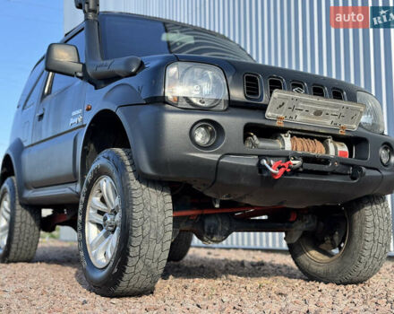 Черный Сузуки Джимни, объемом двигателя 1.3 л и пробегом 100 тыс. км за 7200 $, фото 4 на Automoto.ua