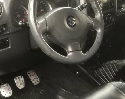 Чорний Сузукі Джімні, об'ємом двигуна 1.3 л та пробігом 164 тис. км за 9900 $, фото 8 на Automoto.ua