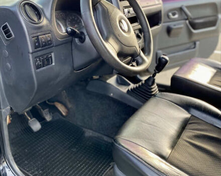 Черный Сузуки Джимни, объемом двигателя 1.33 л и пробегом 292 тыс. км за 5000 $, фото 4 на Automoto.ua