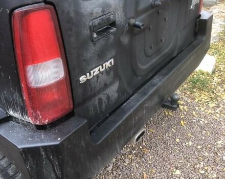 Чорний Сузукі Джімні, об'ємом двигуна 1.3 л та пробігом 164 тис. км за 9900 $, фото 10 на Automoto.ua