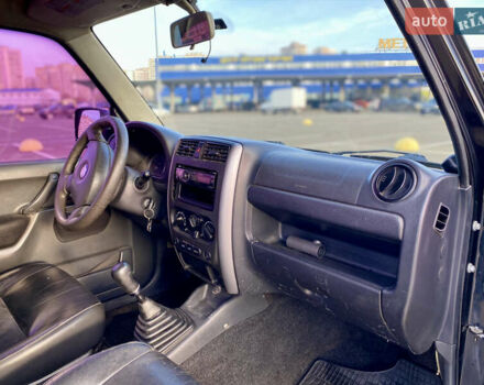 Черный Сузуки Джимни, объемом двигателя 1.33 л и пробегом 292 тыс. км за 5000 $, фото 6 на Automoto.ua