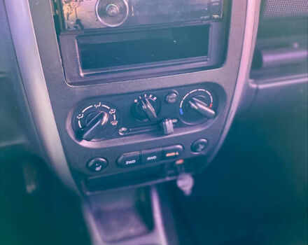 Черный Сузуки Джимни, объемом двигателя 1.33 л и пробегом 292 тыс. км за 5000 $, фото 2 на Automoto.ua