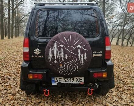 Черный Сузуки Джимни, объемом двигателя 1.33 л и пробегом 148 тыс. км за 8500 $, фото 5 на Automoto.ua