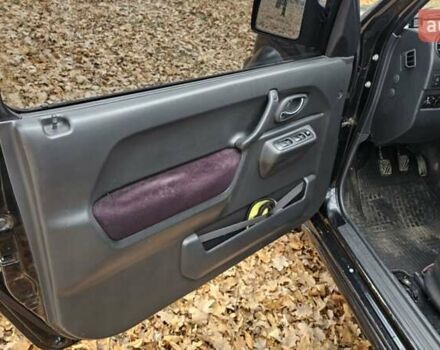 Черный Сузуки Джимни, объемом двигателя 1.33 л и пробегом 148 тыс. км за 8500 $, фото 21 на Automoto.ua