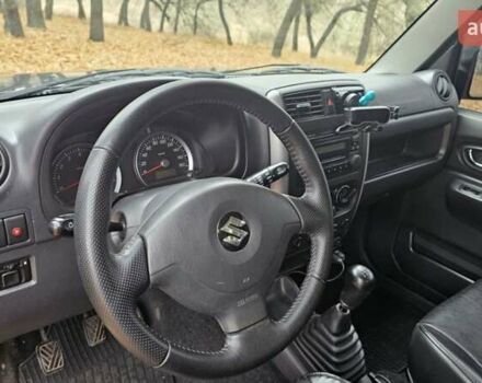 Черный Сузуки Джимни, объемом двигателя 1.33 л и пробегом 148 тыс. км за 8500 $, фото 15 на Automoto.ua