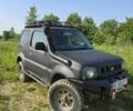 Чорний Сузукі Джімні, об'ємом двигуна 1.3 л та пробігом 170 тис. км за 8900 $, фото 1 на Automoto.ua