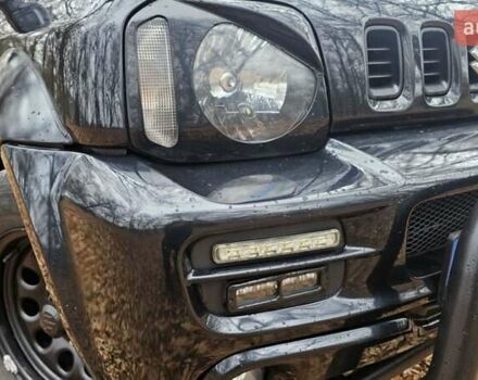 Черный Сузуки Джимни, объемом двигателя 1.33 л и пробегом 148 тыс. км за 8500 $, фото 10 на Automoto.ua