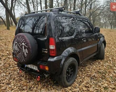 Черный Сузуки Джимни, объемом двигателя 1.33 л и пробегом 148 тыс. км за 8500 $, фото 8 на Automoto.ua