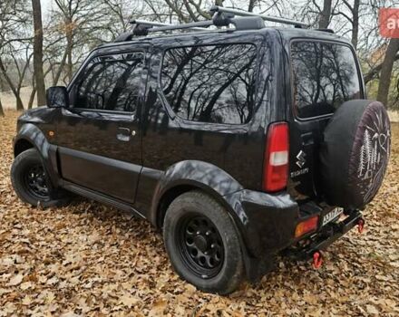 Черный Сузуки Джимни, объемом двигателя 1.33 л и пробегом 148 тыс. км за 8500 $, фото 7 на Automoto.ua