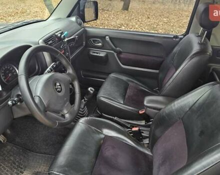 Черный Сузуки Джимни, объемом двигателя 1.33 л и пробегом 148 тыс. км за 8500 $, фото 18 на Automoto.ua
