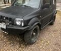 Чорний Сузукі Джімні, об'ємом двигуна 1.3 л та пробігом 164 тис. км за 9900 $, фото 13 на Automoto.ua
