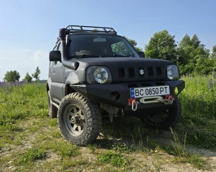 Чорний Сузукі Джімні, об'ємом двигуна 1.3 л та пробігом 170 тис. км за 8900 $, фото 15 на Automoto.ua