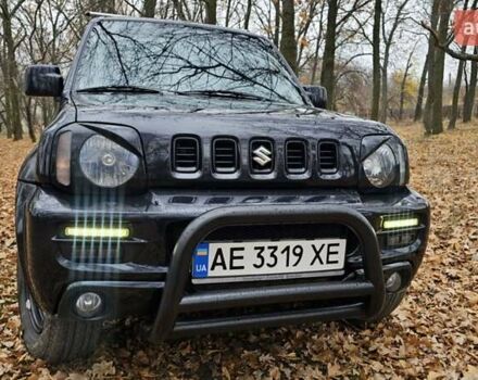 Черный Сузуки Джимни, объемом двигателя 1.33 л и пробегом 148 тыс. км за 8500 $, фото 3 на Automoto.ua