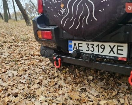 Черный Сузуки Джимни, объемом двигателя 1.33 л и пробегом 148 тыс. км за 8500 $, фото 4 на Automoto.ua