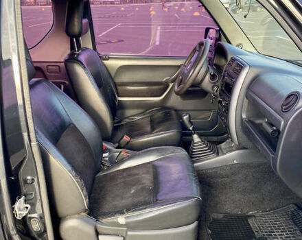 Черный Сузуки Джимни, объемом двигателя 1.33 л и пробегом 292 тыс. км за 5000 $, фото 5 на Automoto.ua