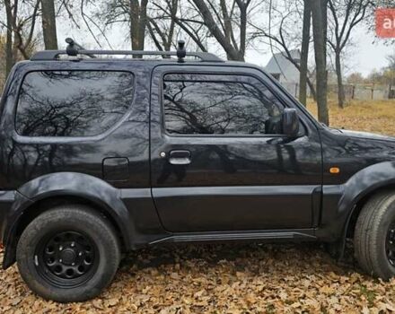 Черный Сузуки Джимни, объемом двигателя 1.33 л и пробегом 148 тыс. км за 8500 $, фото 1 на Automoto.ua