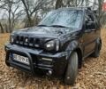 Черный Сузуки Джимни, объемом двигателя 1.33 л и пробегом 148 тыс. км за 8500 $, фото 2 на Automoto.ua