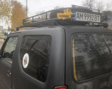 Чорний Сузукі Джімні, об'ємом двигуна 1.3 л та пробігом 164 тис. км за 9900 $, фото 6 на Automoto.ua