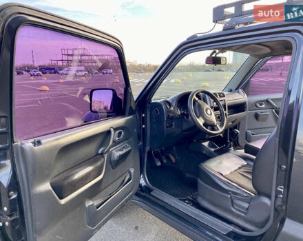 Черный Сузуки Джимни, объемом двигателя 1.33 л и пробегом 292 тыс. км за 5000 $, фото 9 на Automoto.ua