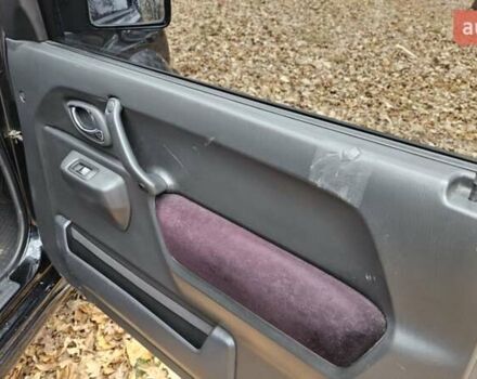 Черный Сузуки Джимни, объемом двигателя 1.33 л и пробегом 148 тыс. км за 8500 $, фото 19 на Automoto.ua