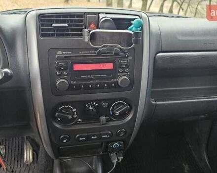 Черный Сузуки Джимни, объемом двигателя 1.33 л и пробегом 148 тыс. км за 8500 $, фото 16 на Automoto.ua