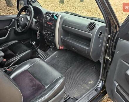 Черный Сузуки Джимни, объемом двигателя 1.33 л и пробегом 148 тыс. км за 8500 $, фото 20 на Automoto.ua