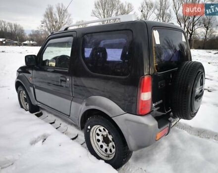 Чорний Сузукі Джімні, об'ємом двигуна 1.3 л та пробігом 163 тис. км за 7700 $, фото 11 на Automoto.ua