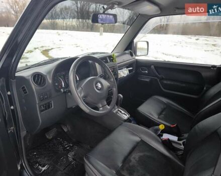 Чорний Сузукі Джімні, об'ємом двигуна 1.3 л та пробігом 163 тис. км за 7700 $, фото 12 на Automoto.ua