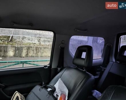 Чорний Сузукі Джімні, об'ємом двигуна 1.3 л та пробігом 164 тис. км за 7450 $, фото 7 на Automoto.ua