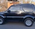 Черный Сузуки Джимни, объемом двигателя 1.3 л и пробегом 225 тыс. км за 6500 $, фото 9 на Automoto.ua
