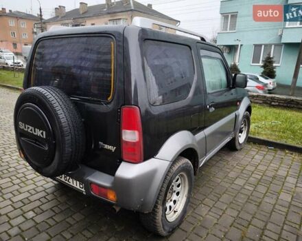 Чорний Сузукі Джімні, об'ємом двигуна 1.3 л та пробігом 164 тис. км за 7450 $, фото 12 на Automoto.ua
